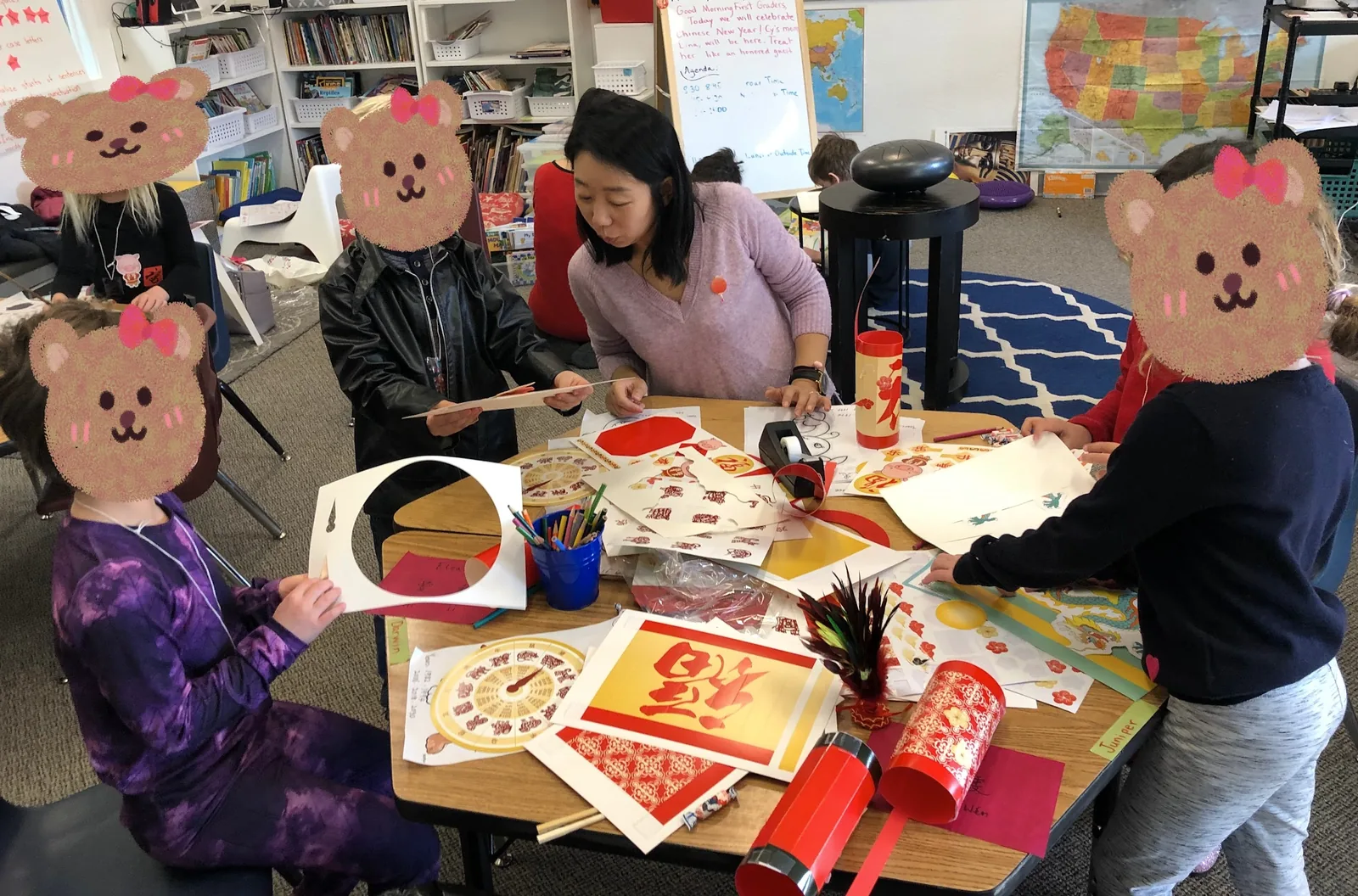 Teacher Mini guiding students through a Chinese New Year craft activity